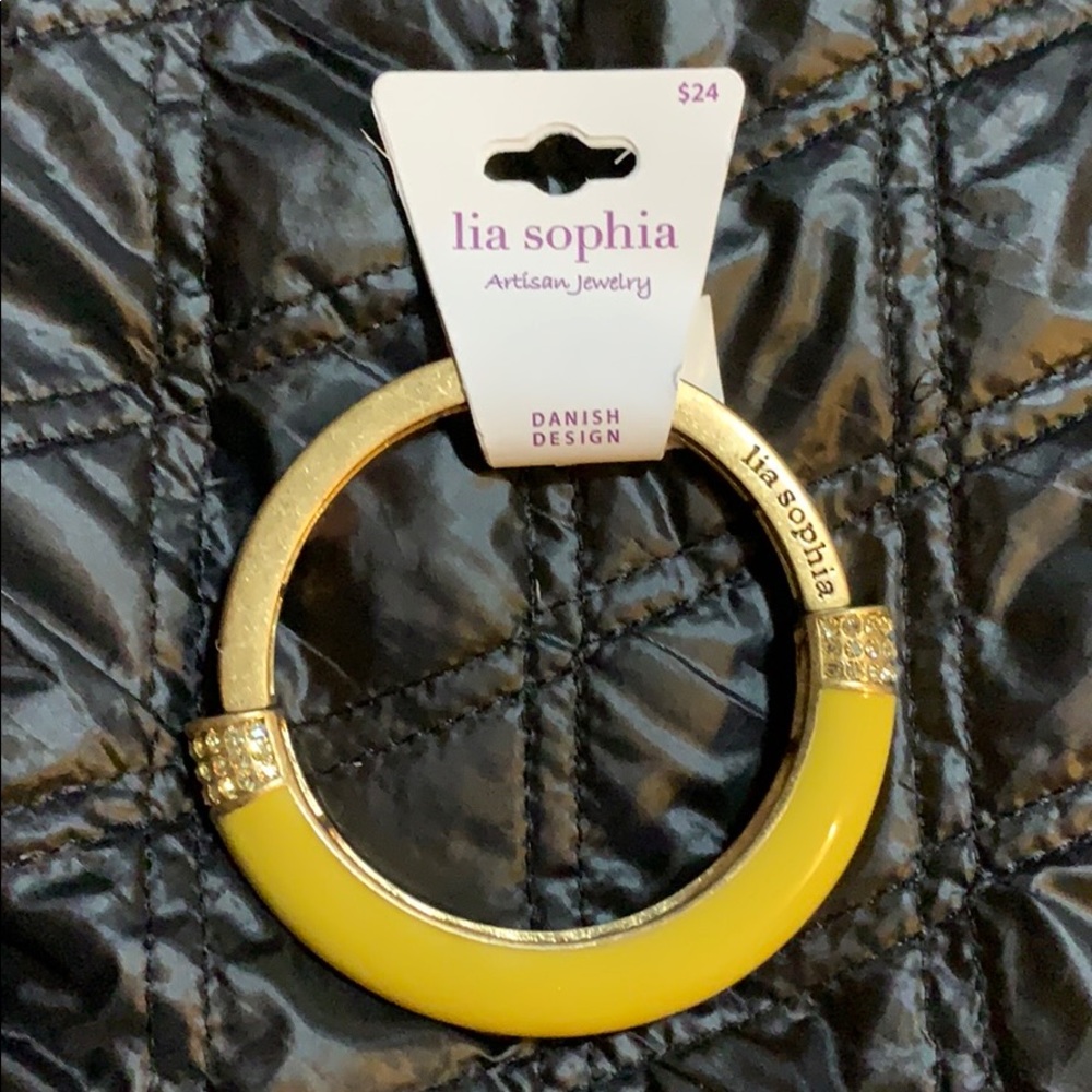 Gold tone with yellow enamel and rhinestone accent